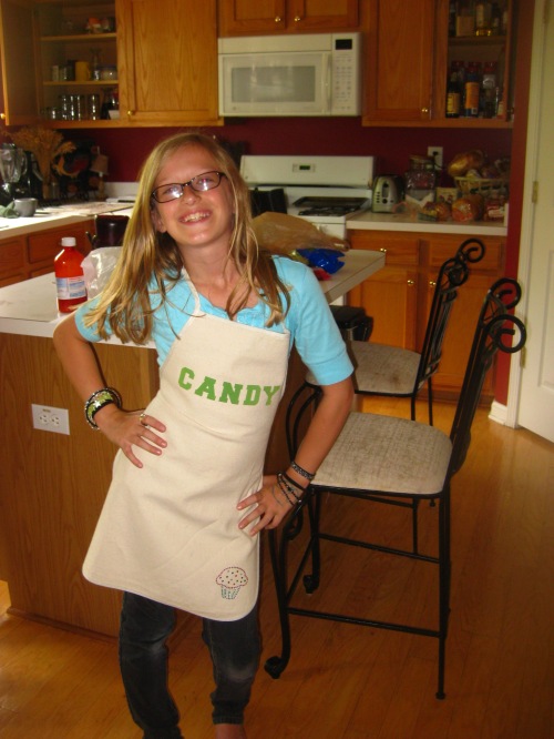 Candy in her new apron